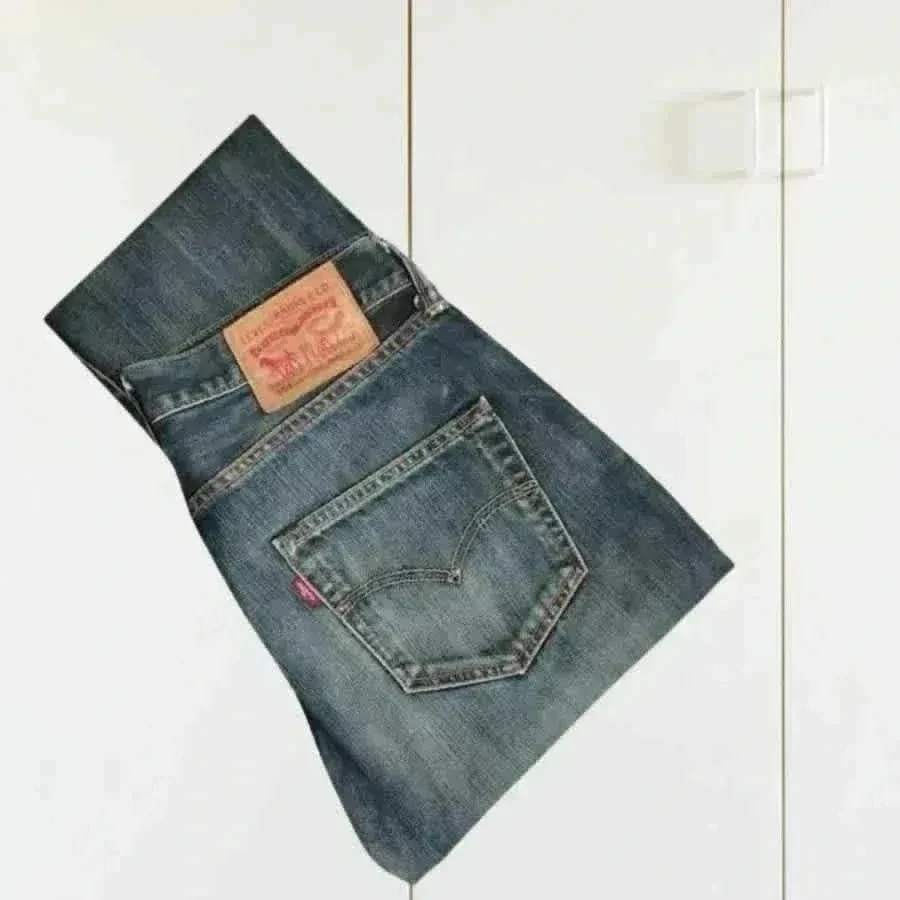 LEVIS 501 - corte reto - cintura alta - 100% algodão - azul escuro - muito bom estado – photo 11